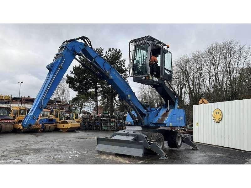 Fuchs MHL320 Paleta de manipulare