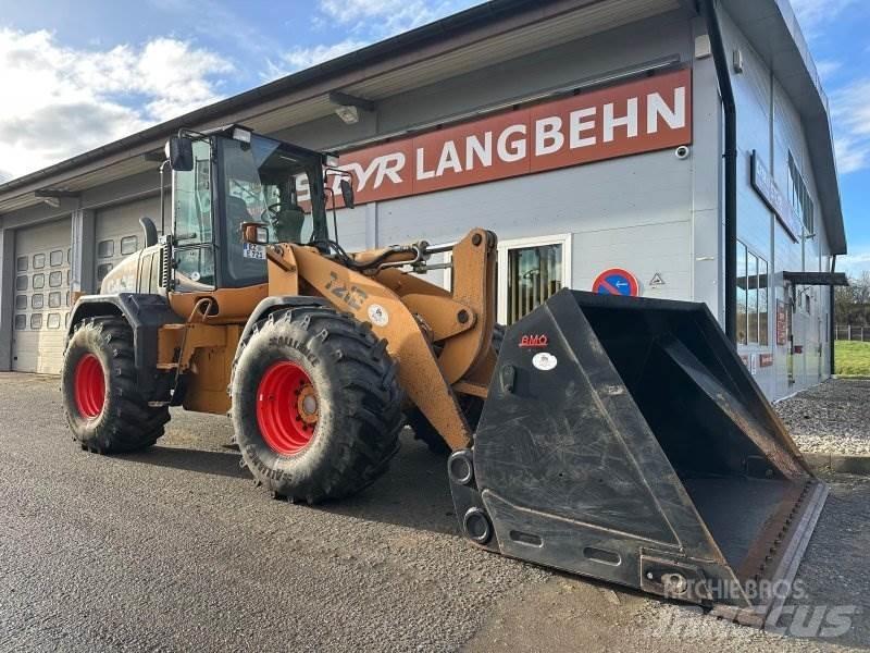 CASE 721 E Incarcator pe pneuri