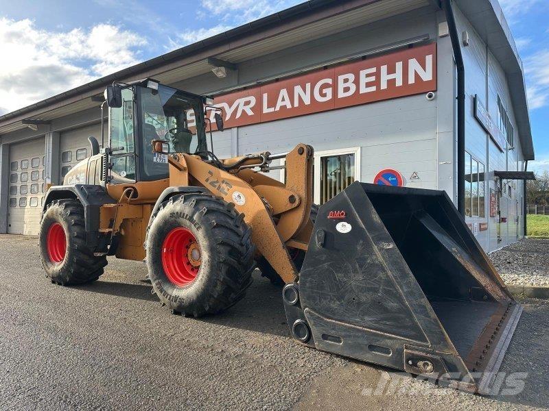 CASE 721 E Incarcator pe pneuri