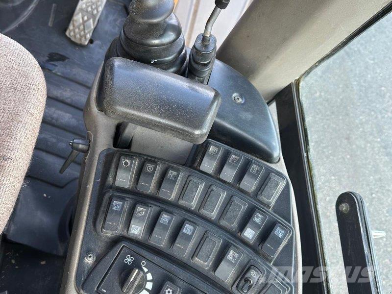 CASE 721 E Incarcator pe pneuri