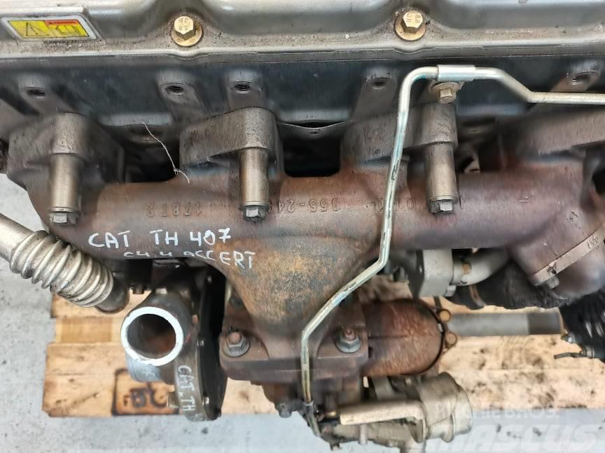CAT TH 337 exhaust manifold  CAT C4.4 Accert} Motoare