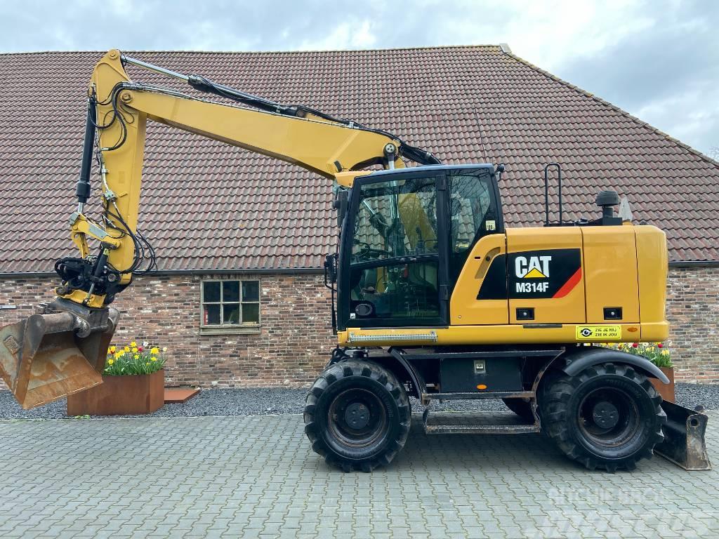 CAT M314F inclusief Engcon EC214 Excavatoare cu roti