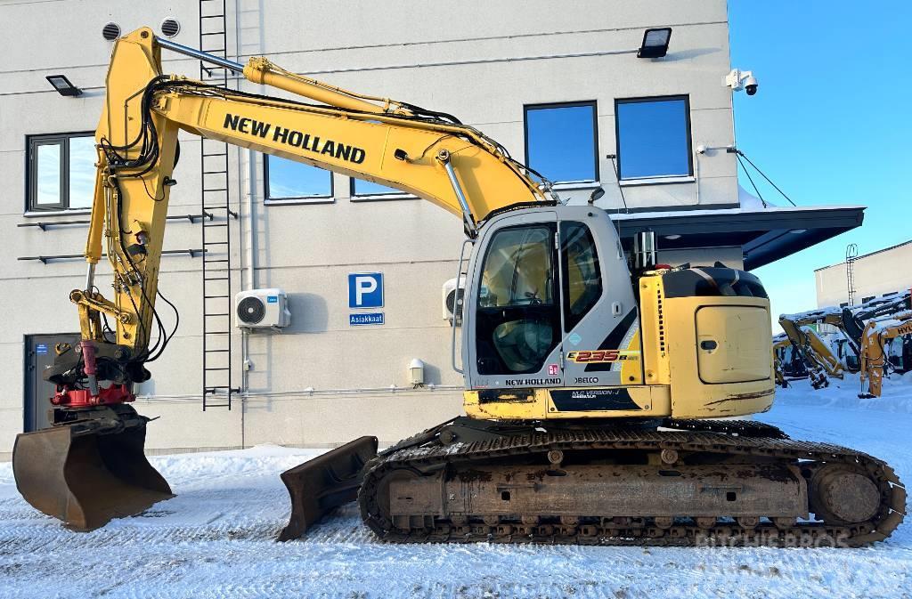New Holland E235BSR-2 Pyörittäjällä Excavatoare pe senile