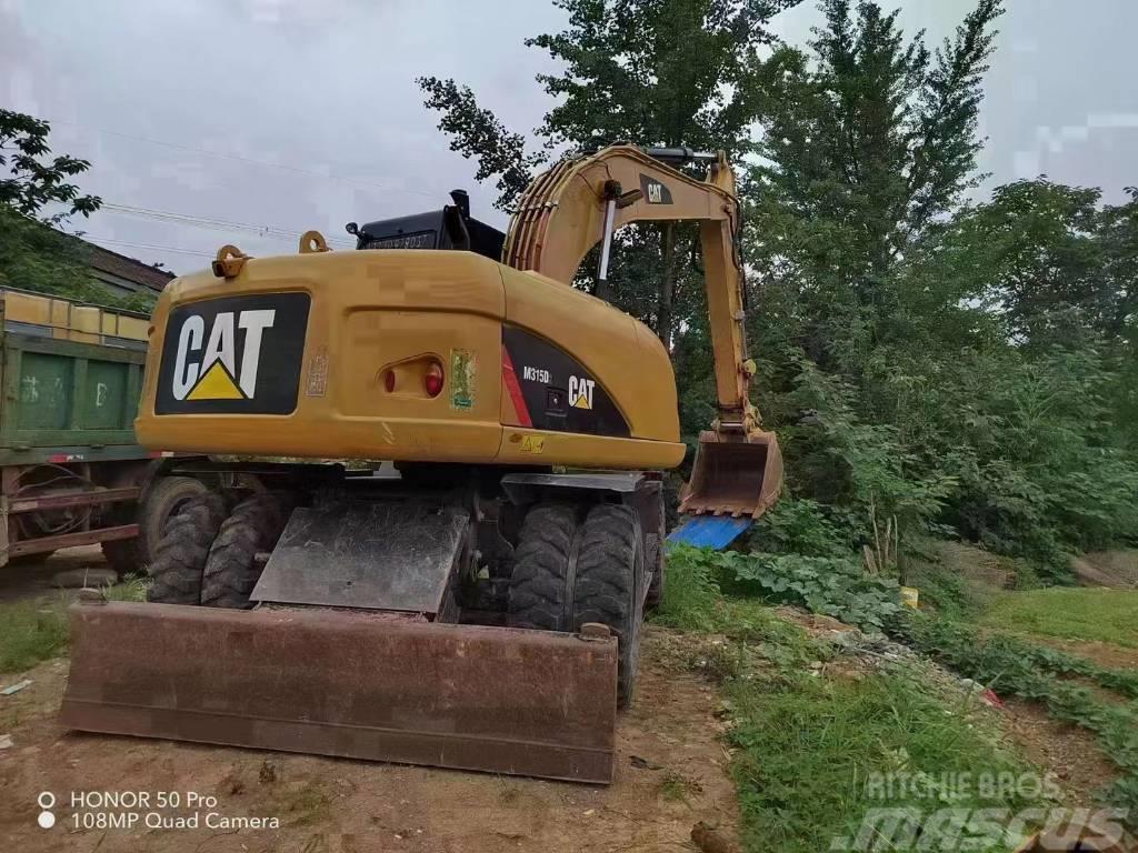 CAT M 315 D Excavatoare cu roti