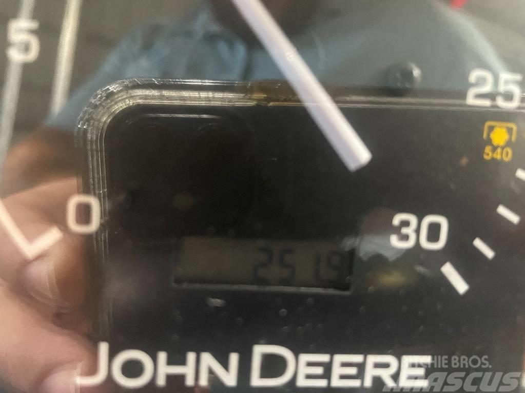 John Deere 110 Buldoexcavatoare