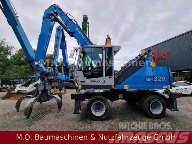 Fuchs MHL 320 /AC /Magnetalage/ZSA/Hochfahrbare Kabine Excavatoare cu roti